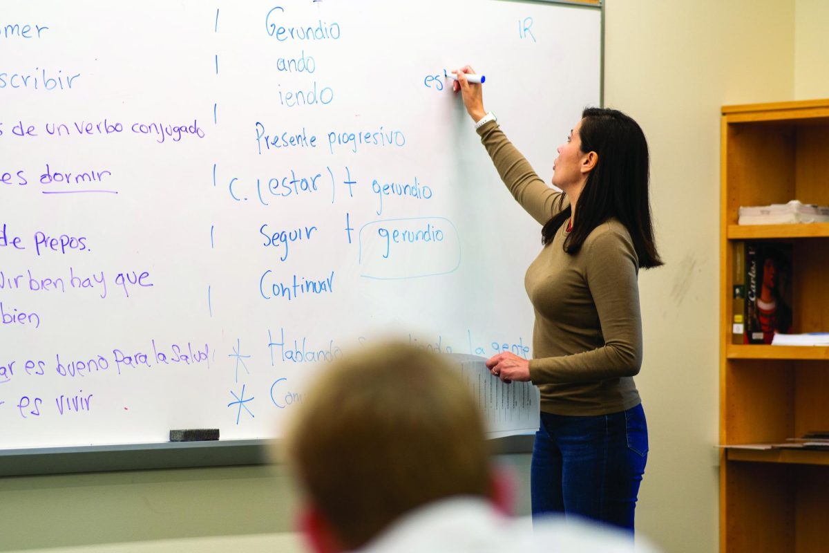 IN THE CLASSROOM Spanish instructor Dr. Katherine Anson teaches a grammar lesson. Anson is one of 14 teachers in the Upper School Language Department.