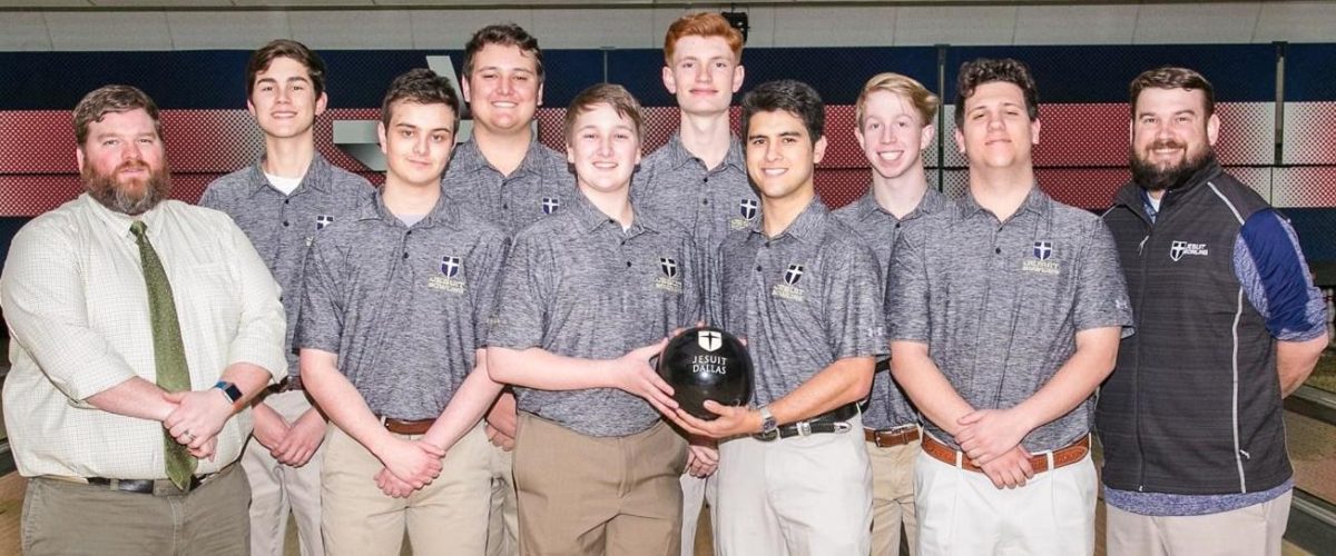 New mathematics instructor Ken Howell with the Jesuit bowling team.