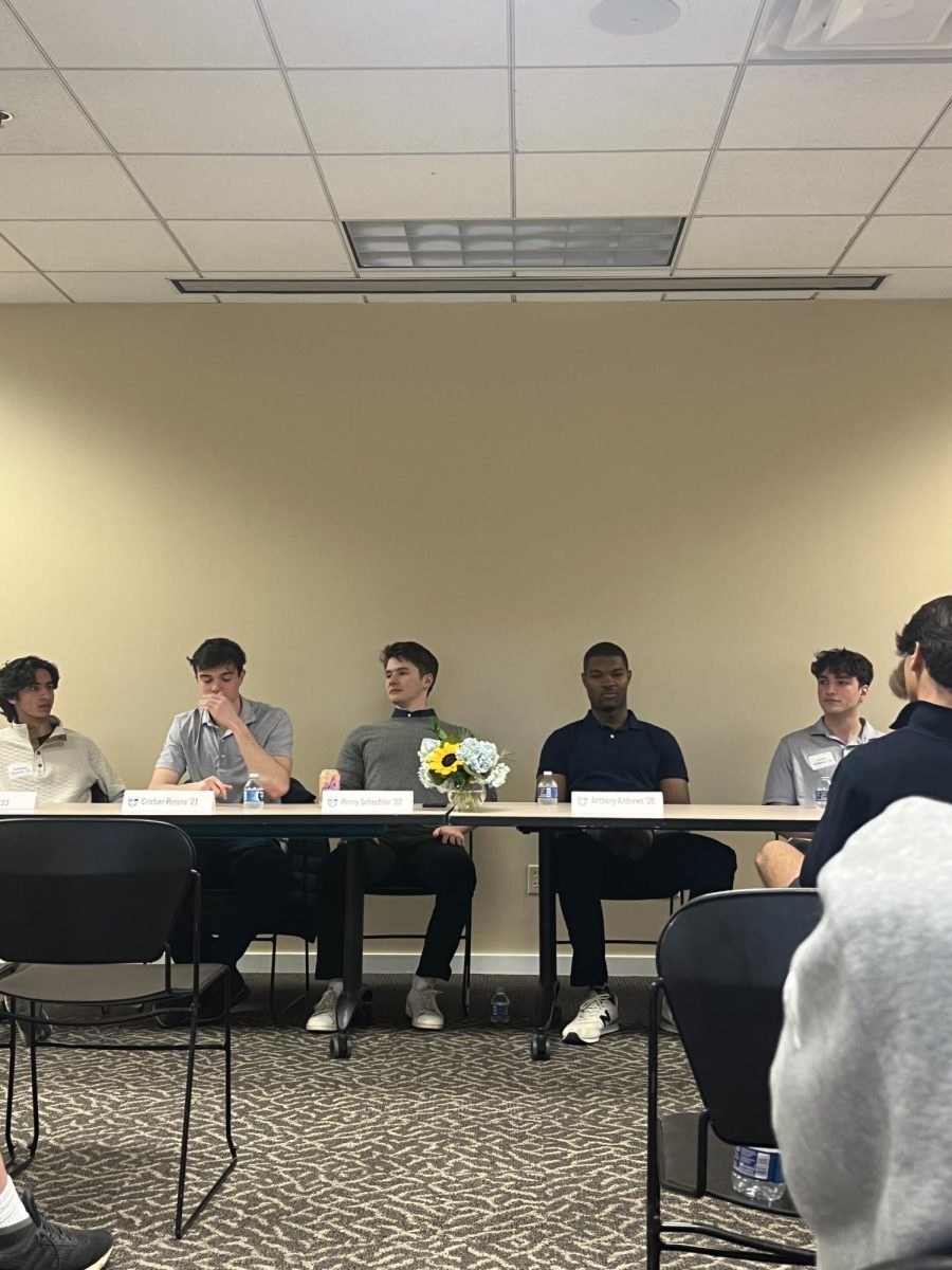 Left to right: Sal Hussain 23, Christian Pereira 21 Henry Schecter 22, Anthony Andrews 20 and Austin Williams 21 talk about their experiences outside of St. Marks.