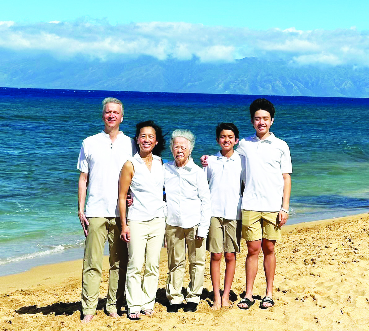 FAMILY BONDS Householder and his family, including his grandmother (center), pose for family photograph at the beach. 