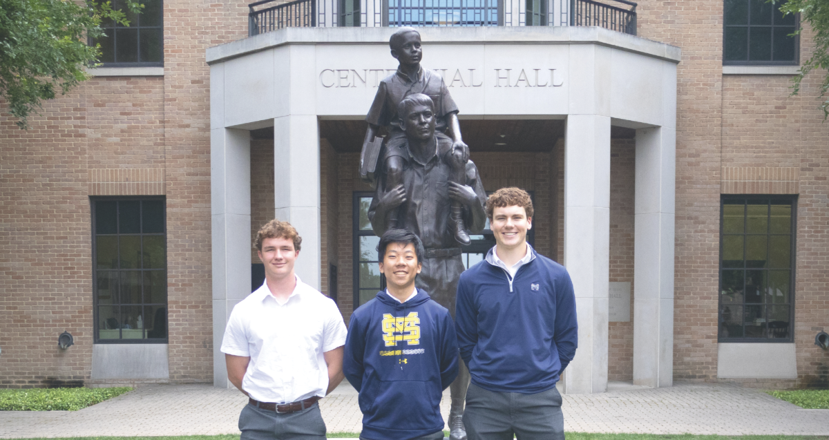 THE FUTURE Sophomore Adam Dalrymple (left), junior Andrew Jin (middle) and junior Matthew Hofmann (right) pose for an Executive Student Council photo. 