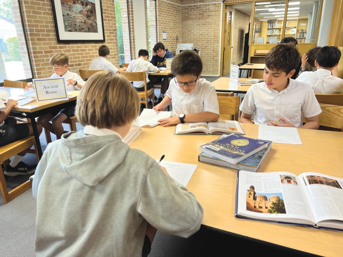 ANCIENT CIVILIZATIONS Students in instructor William Atkinson’s sixth grade humanities class research the ancient Greeks and Romans for a project.