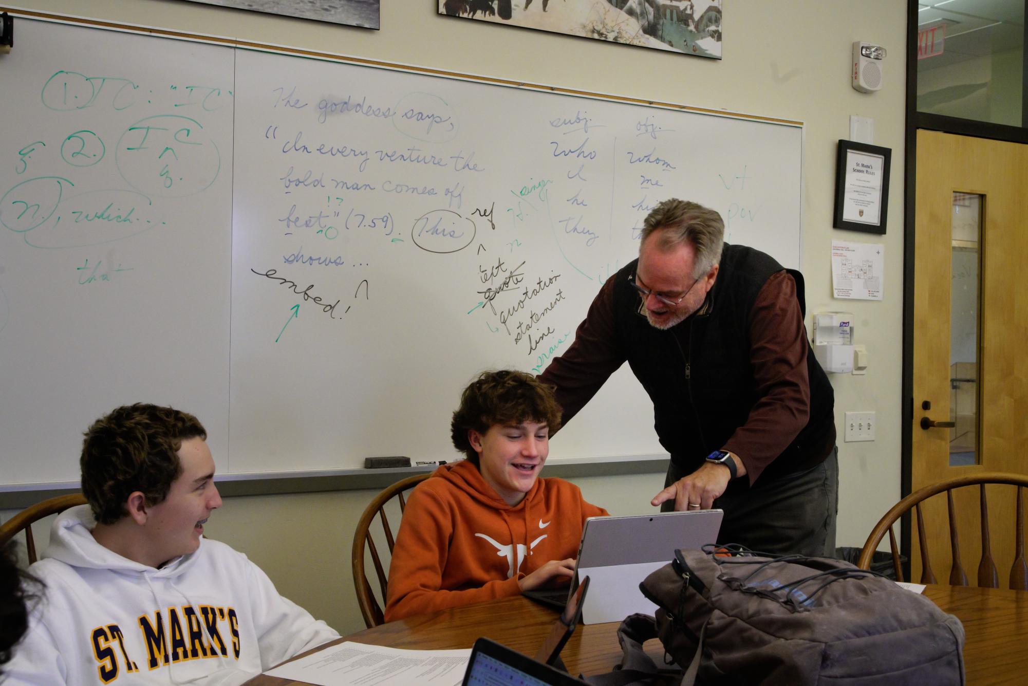 Stegemoeller assists one of his students in class