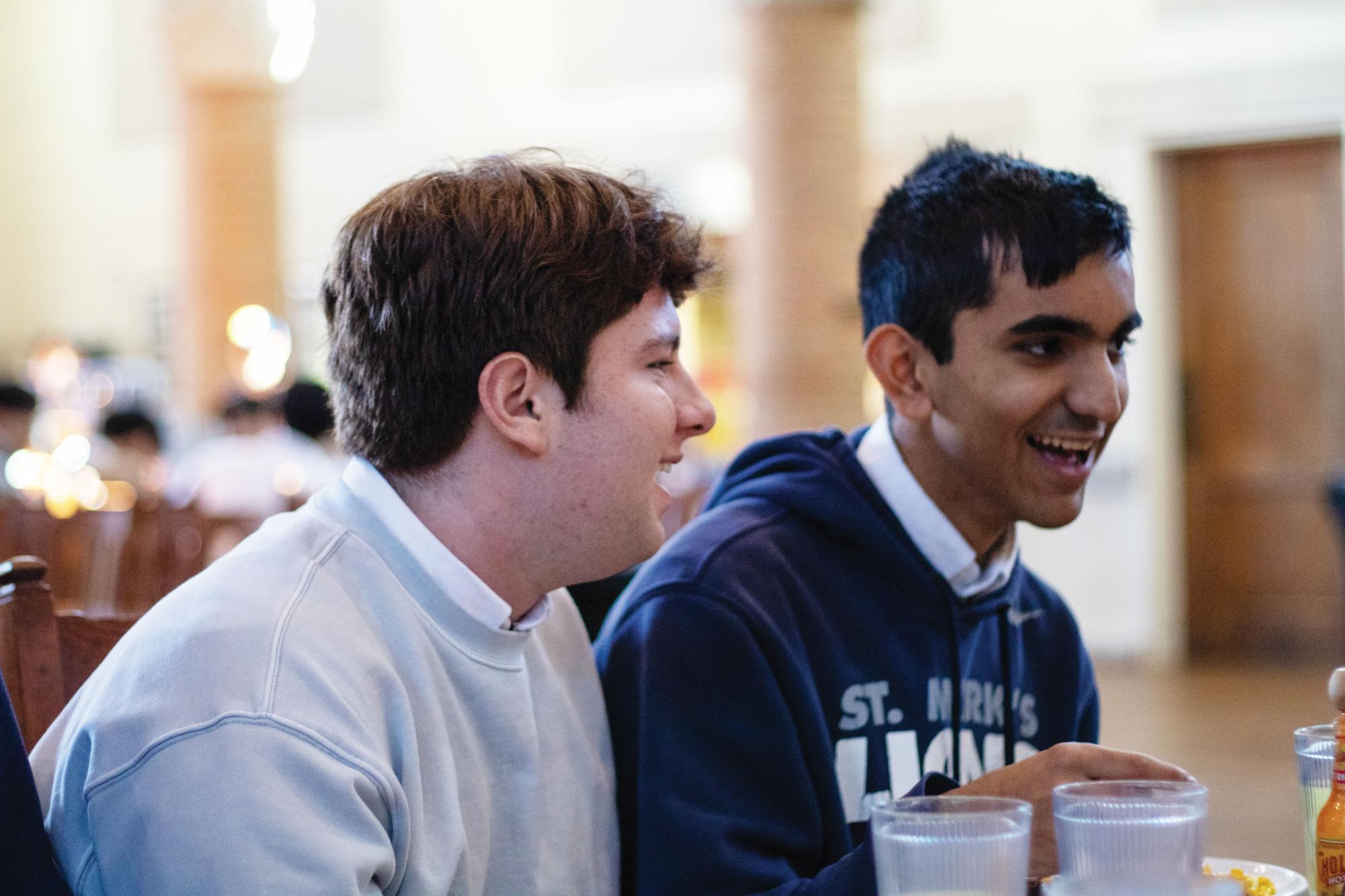 Junior Nathaniel Hochman hangs out with friends during lunch in the Great Hall.