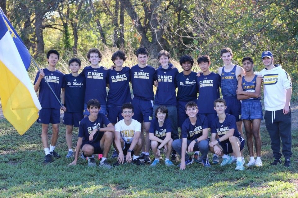 The team poses after their final race together.