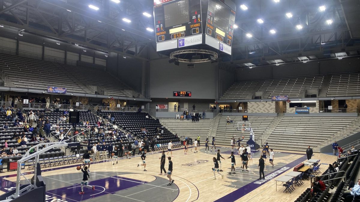 The Lions won the 84th Annual Dallas ISD Holiday Hoops Tournament with a 54-50 overtime victory over Panther Creek Dec. 28 at Ellis Davis Fieldhouse.