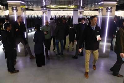 Community members marvel at the state-of-the-art facilities inside the new locker room. 