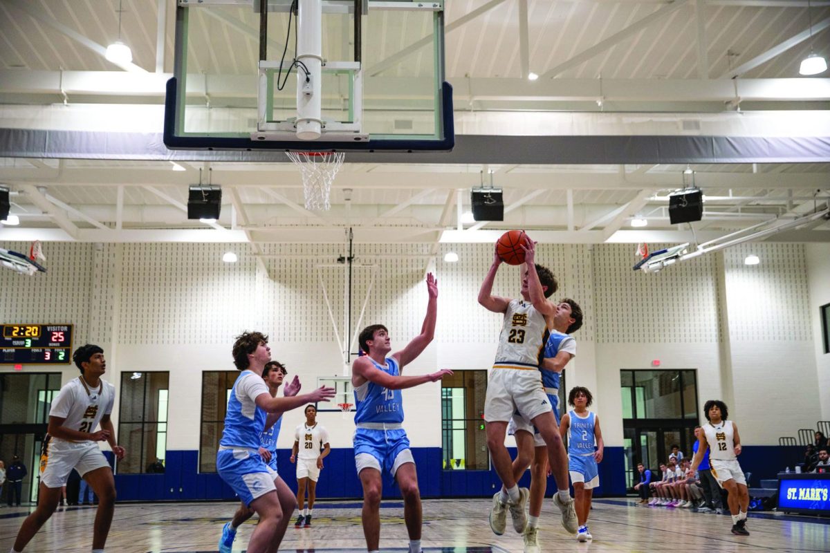 Junior Spencer Hopkins goes for a layup in the first ever game in the Zierk Athletic Center