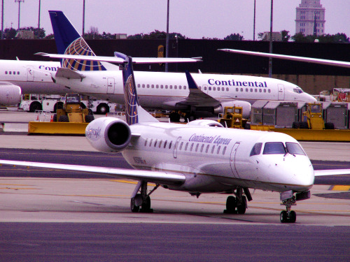 An airplane waits on the runway after a safety inspection