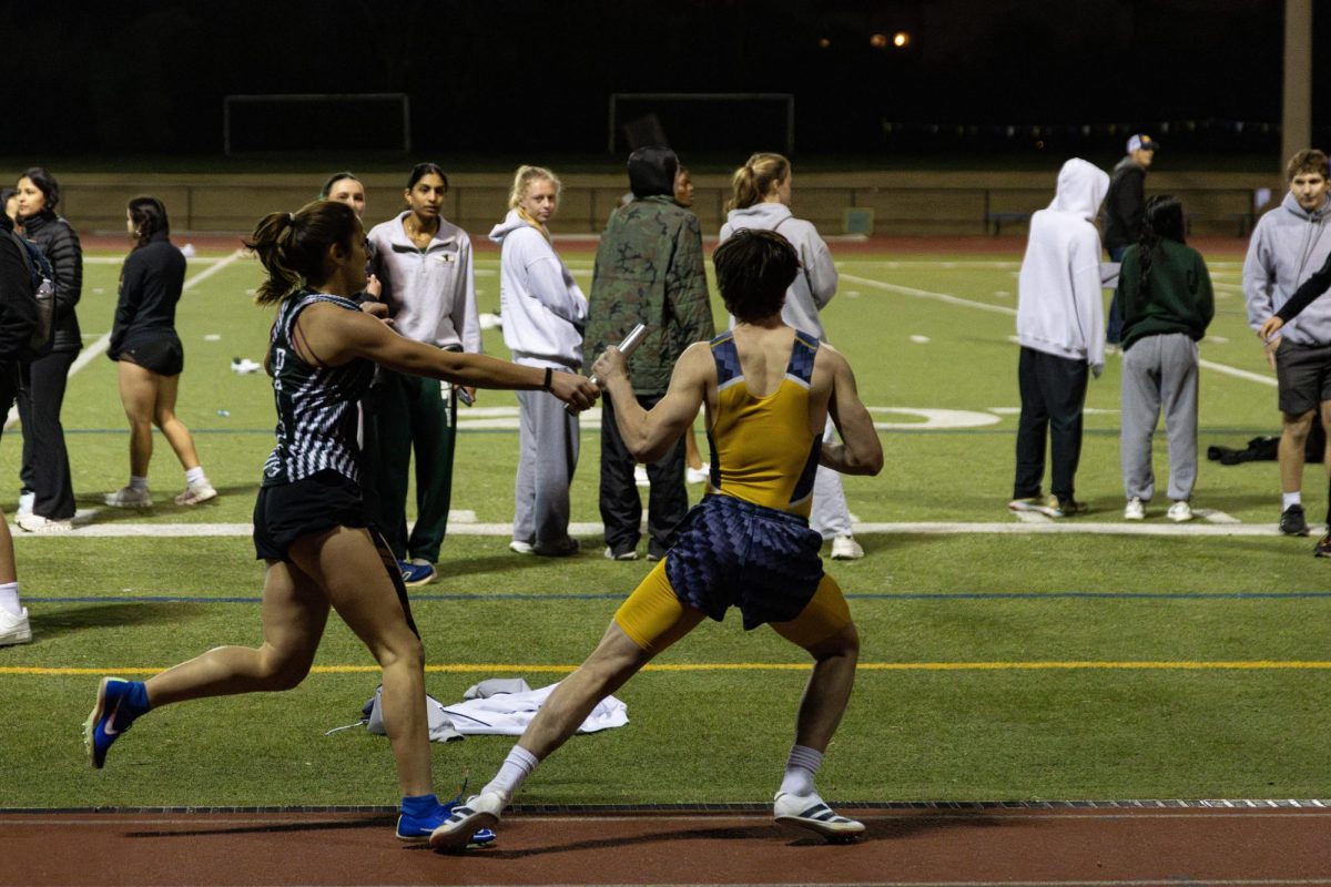 Hockaday and St. Mark's compete in the mixed relay at the meet on campus