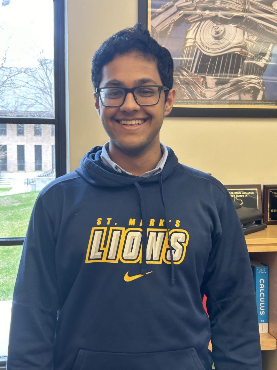 Senior Surya Dinesh smiles while participating in the St. Mark's Latin tournament. 