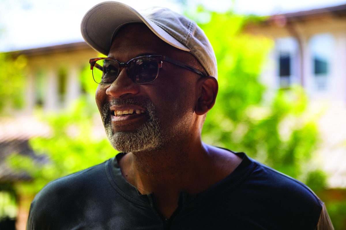 Dwight Phillips poses for a photo