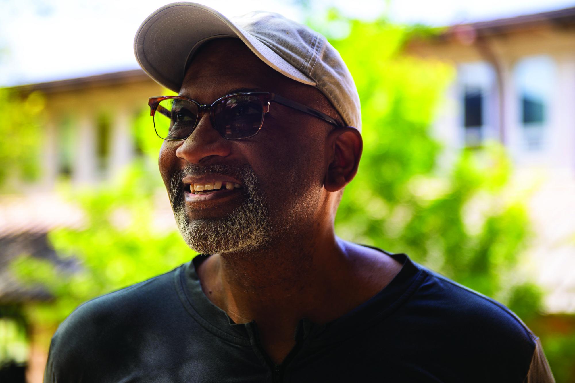 Dwight Phillips poses for a photo