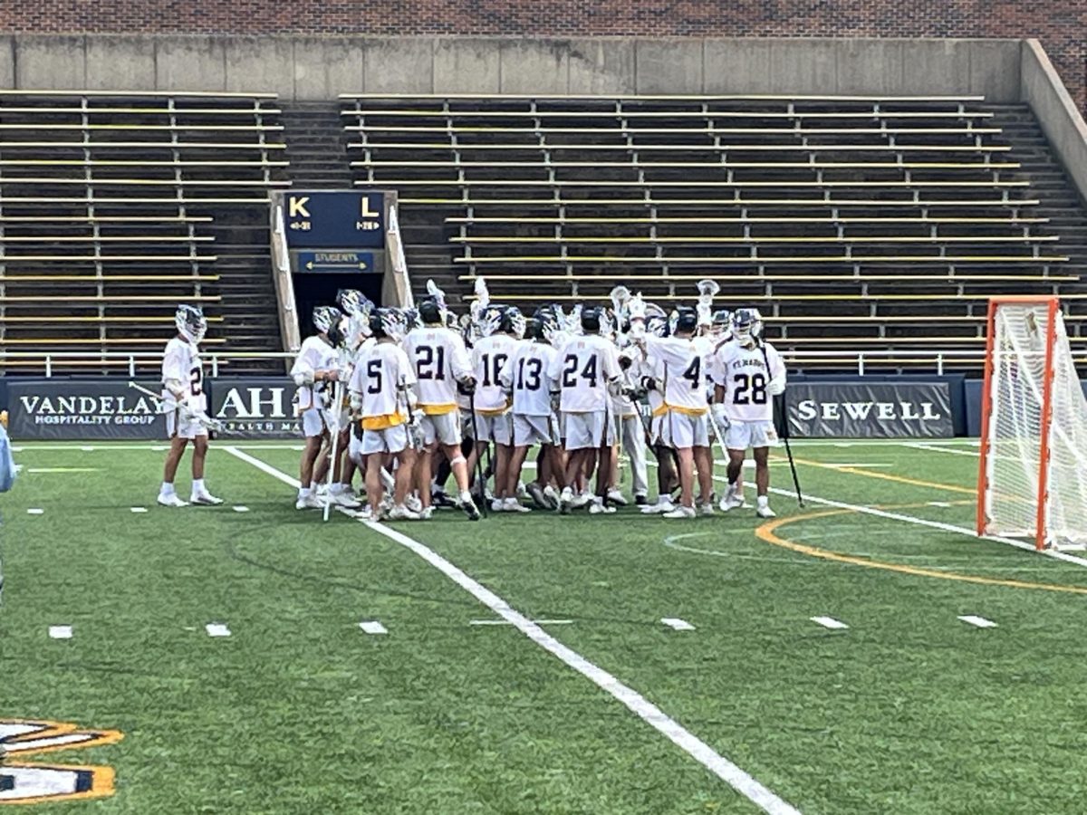 Lacrosse celebrates after winning the state championship