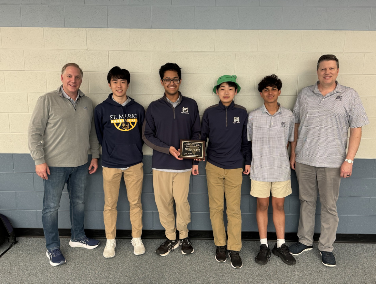 The Quiz Bowl Team stands with their third place trophy