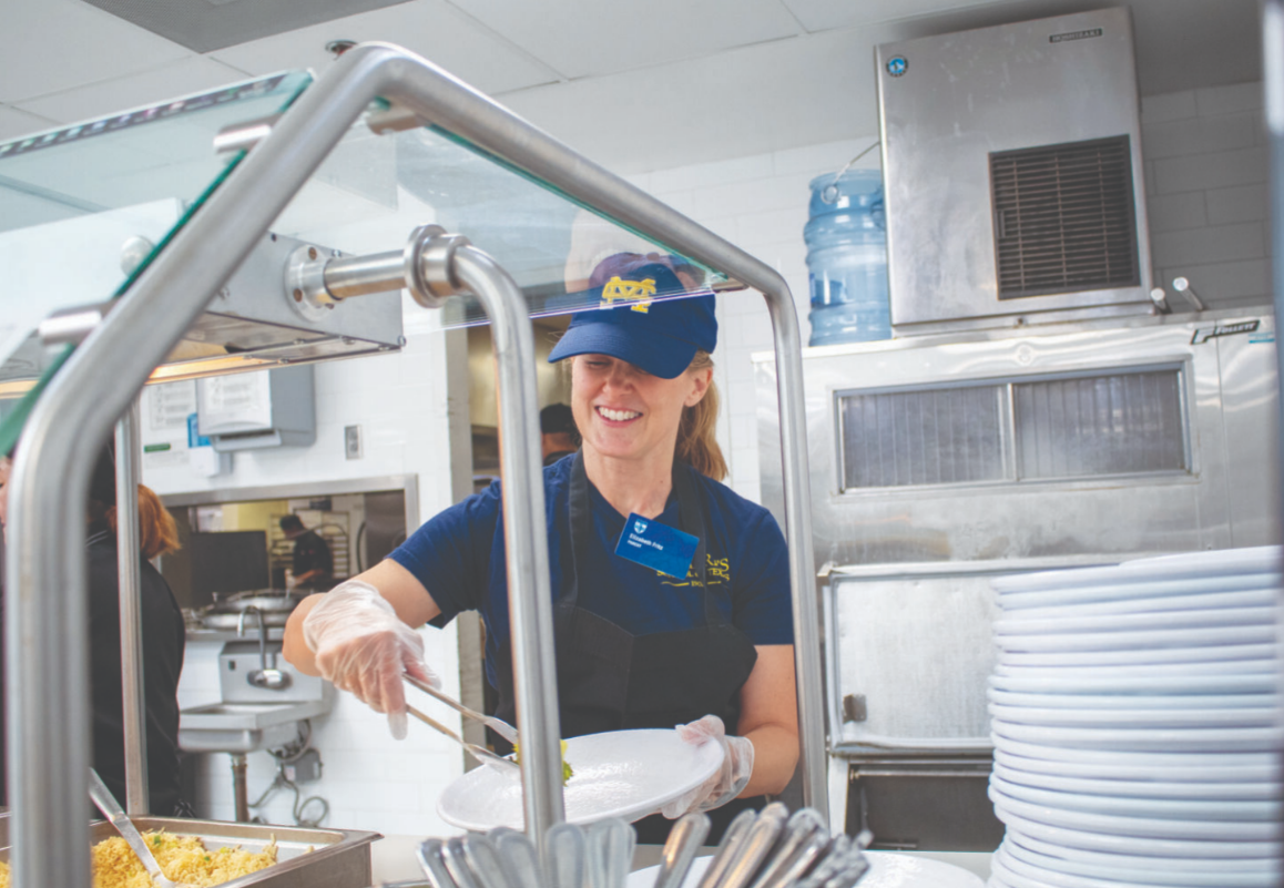 Moms volunteer to work on campus in places such as the cafeteria.