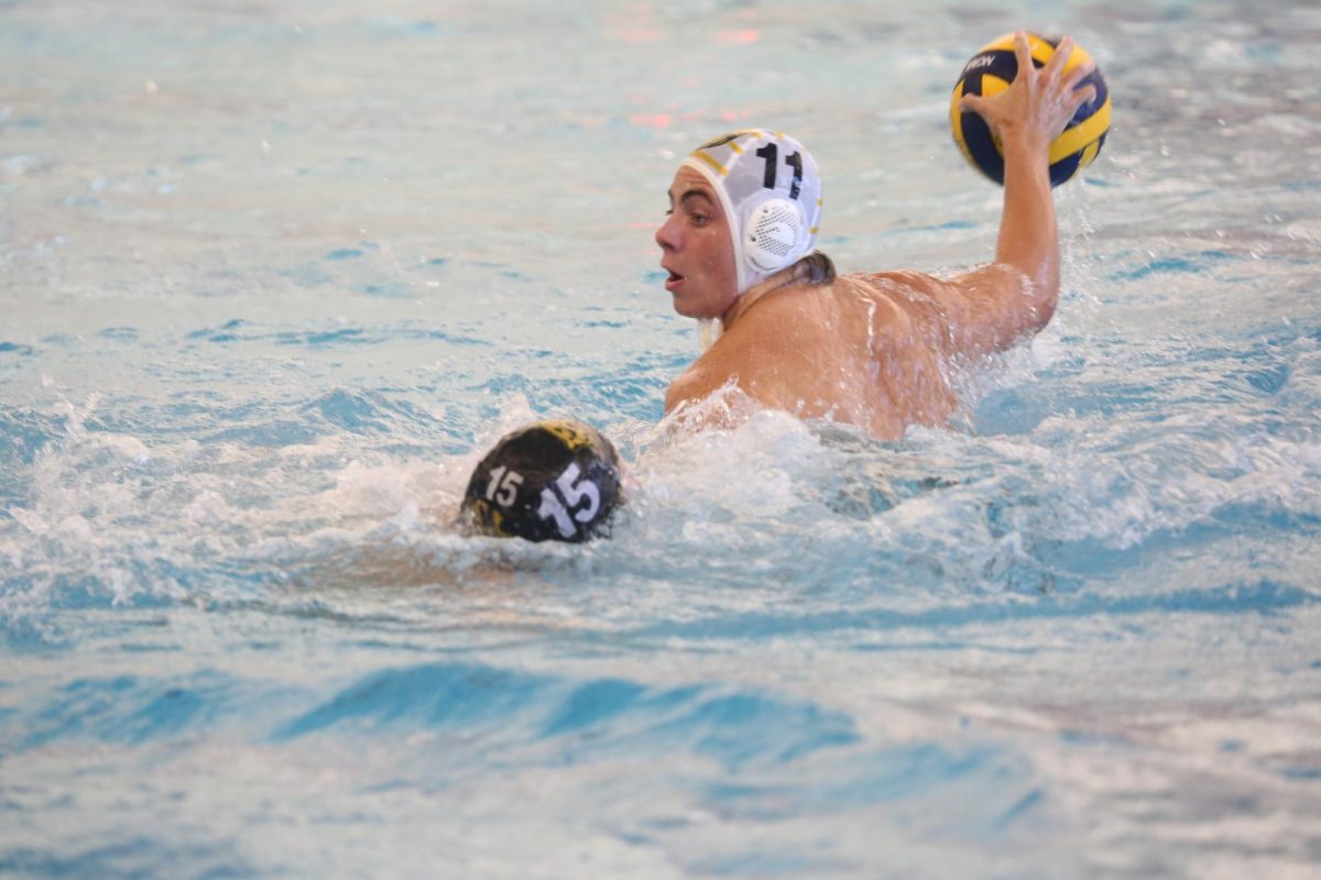 Senior Oliver Geheb winds up for a shot on goal