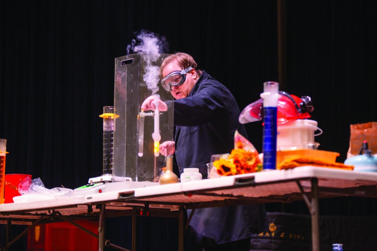 Owens demonstrates an explosion at his annual McDonald’s Week chemistry show.