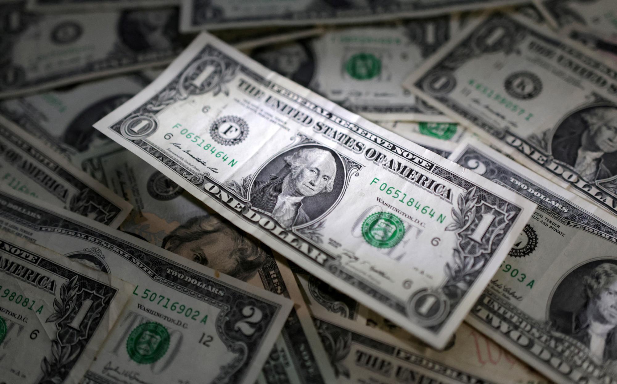 U.S. dollar banknotes are seen in this illustration taken March 10, 2023. 