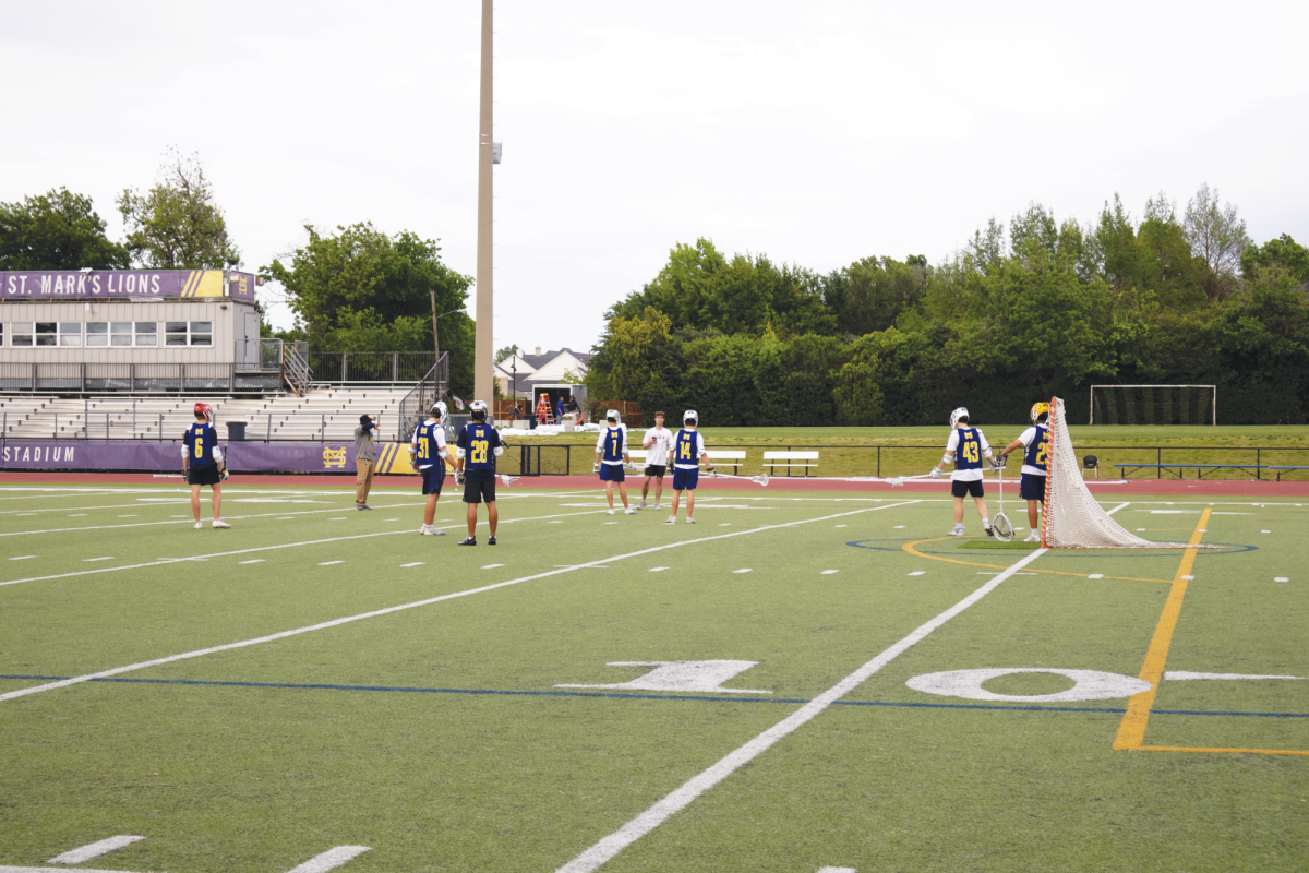 The lacrosse team takes time after ISAS ends to practice as a team and prepare their gameplan against ESD. Normally practicing in the afternoon, the team now has to wait until the evening to begin practice.