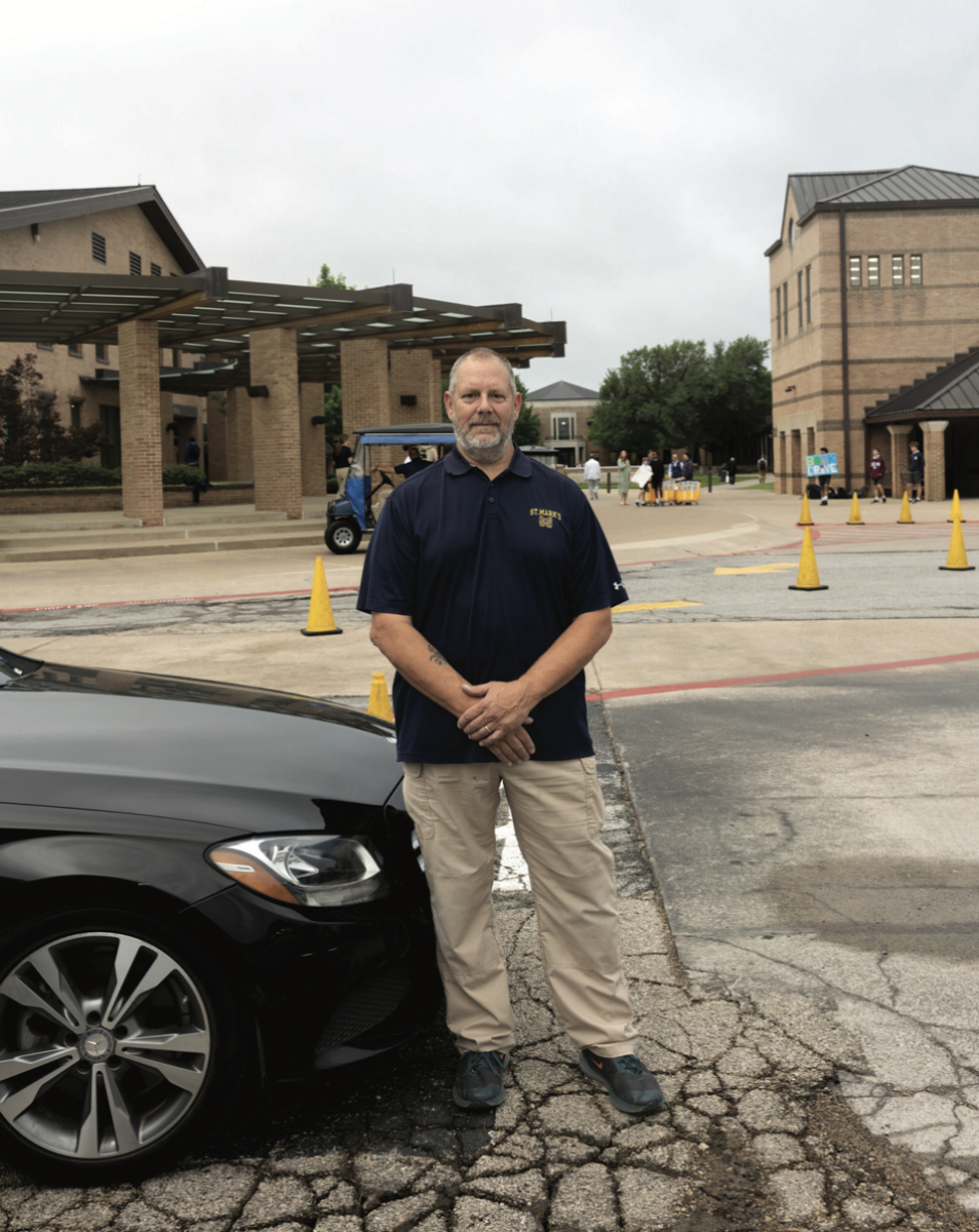 Stefen Glenn stands in front of Nearburg Hall