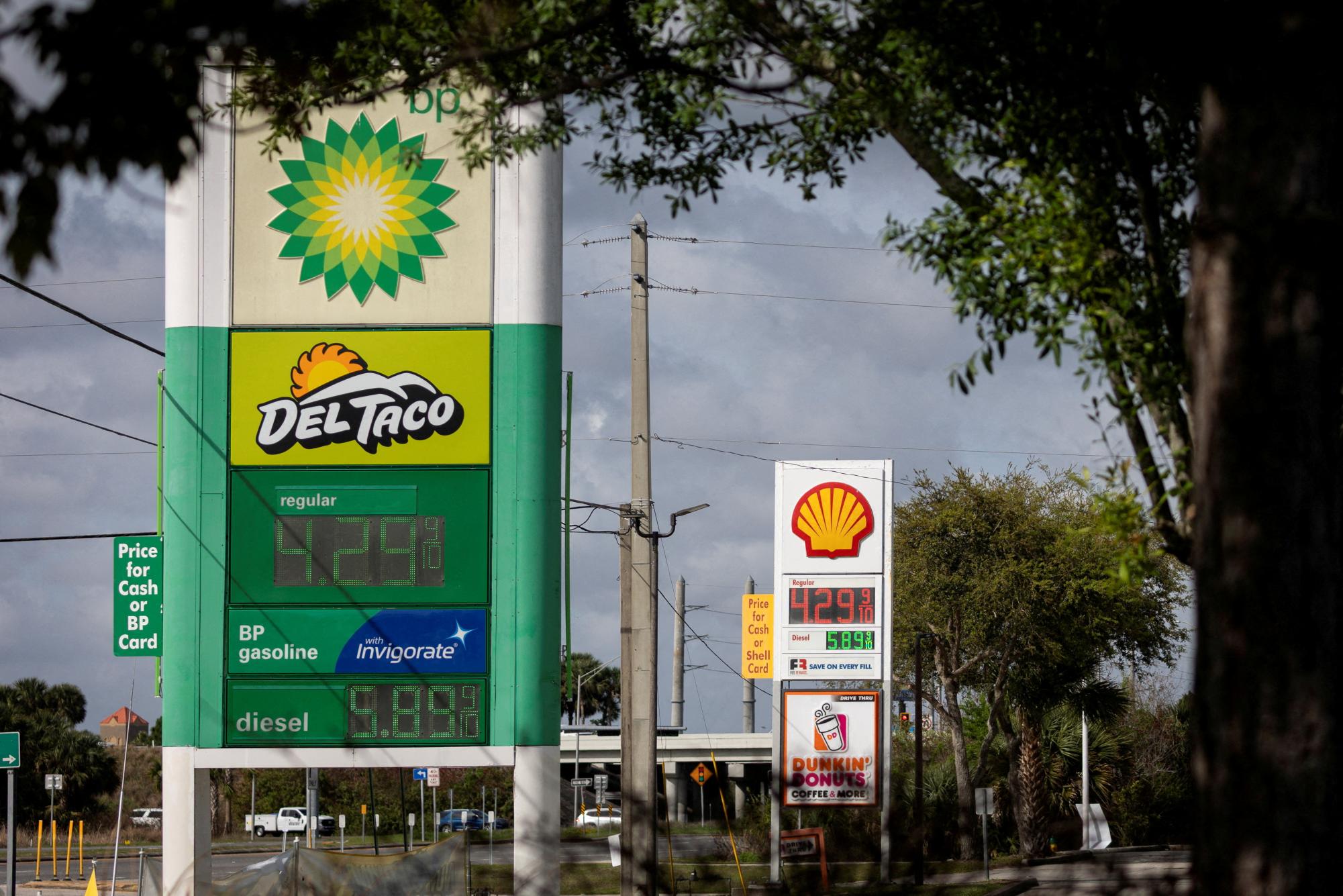 Gas prices are displayed at a gas station as the prices of oil and gas surge, amid the Iran war, in Titusville, Florida, U.S., March 31, 2026. 