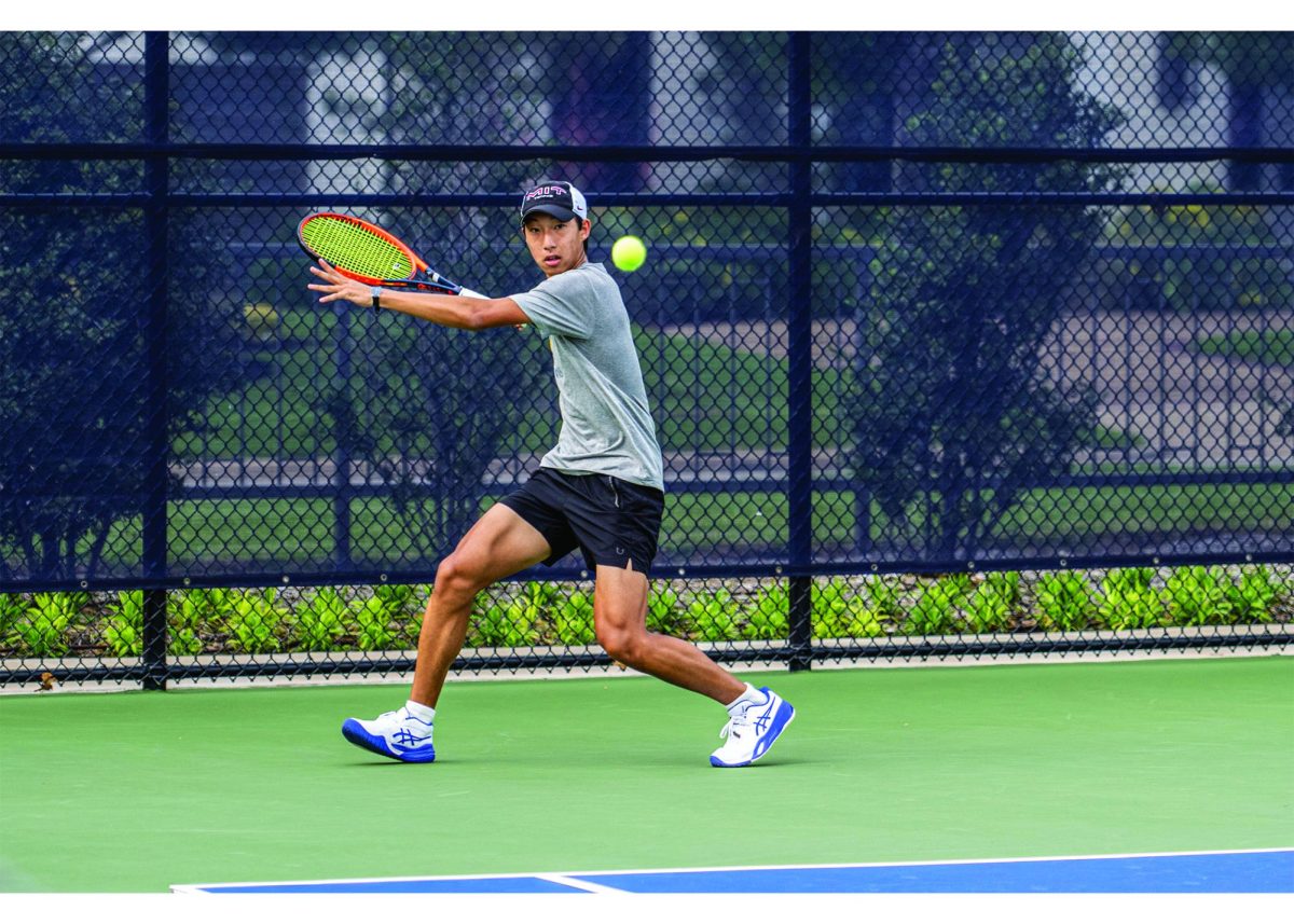Bryan Li hits a forehand shot. The sophomore has learned mental discipline through playing tennis alone.