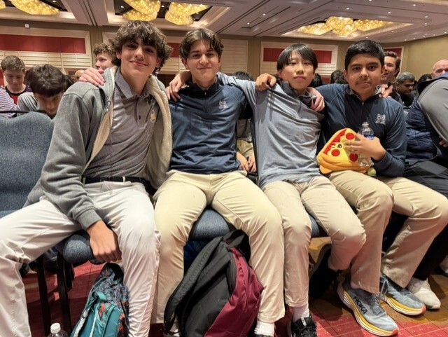 Members of the St. Mark's Middle School A-team await awards after winning the national championship. From left to right: Nathan Aurora, Kamran Nawaz, Roger Wang and Ritam Setu.