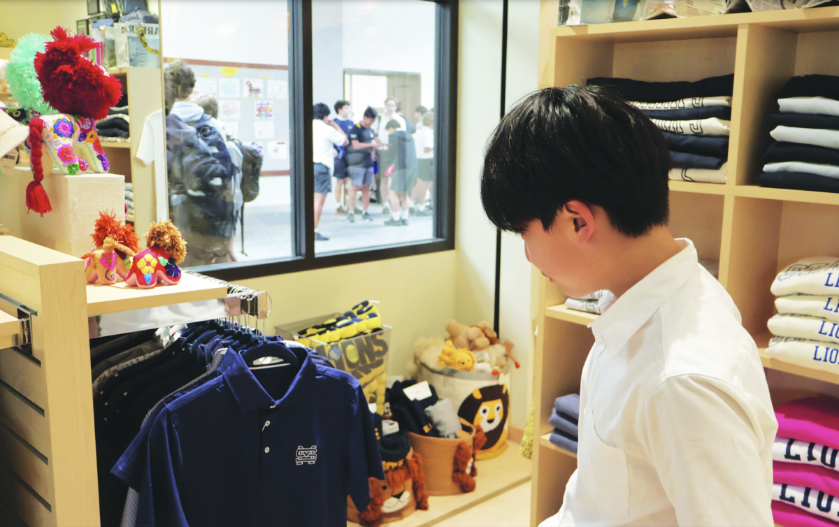 David Zhao 29’ shops in the student store for St. Mark’s branded apparel.  The store offers a wide variety of  formal and athletic clothes that display school pride.