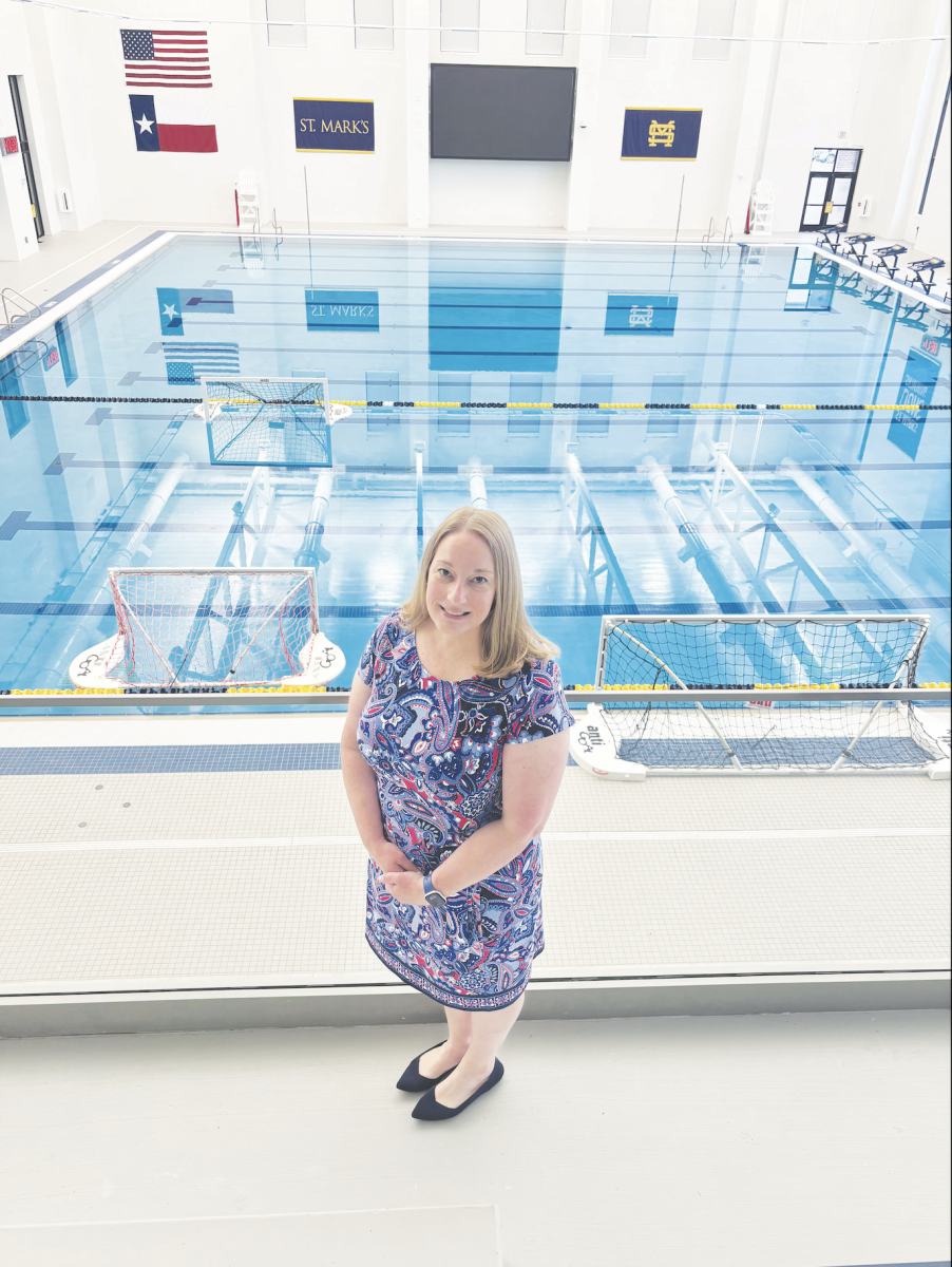 Kristin Mlakar poses in front of the Levering Pool. She played a pivotal role in planning the Zierk Athletic Complex.