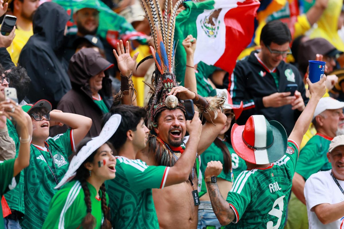 Soccer Football - FIFA World Cup 2026 - Group A - Mexico v South Africa - Estadio Azteca, Mexico City, Mexico - June 11, 2026 Mexico fans celebrate after Raul Jimenez scores their second goal.